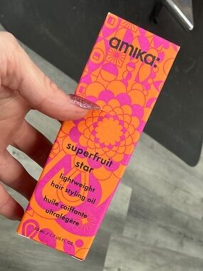 amika Superfruit Star Lightweight Hair Styling Oil - Pink & Orange Packaging